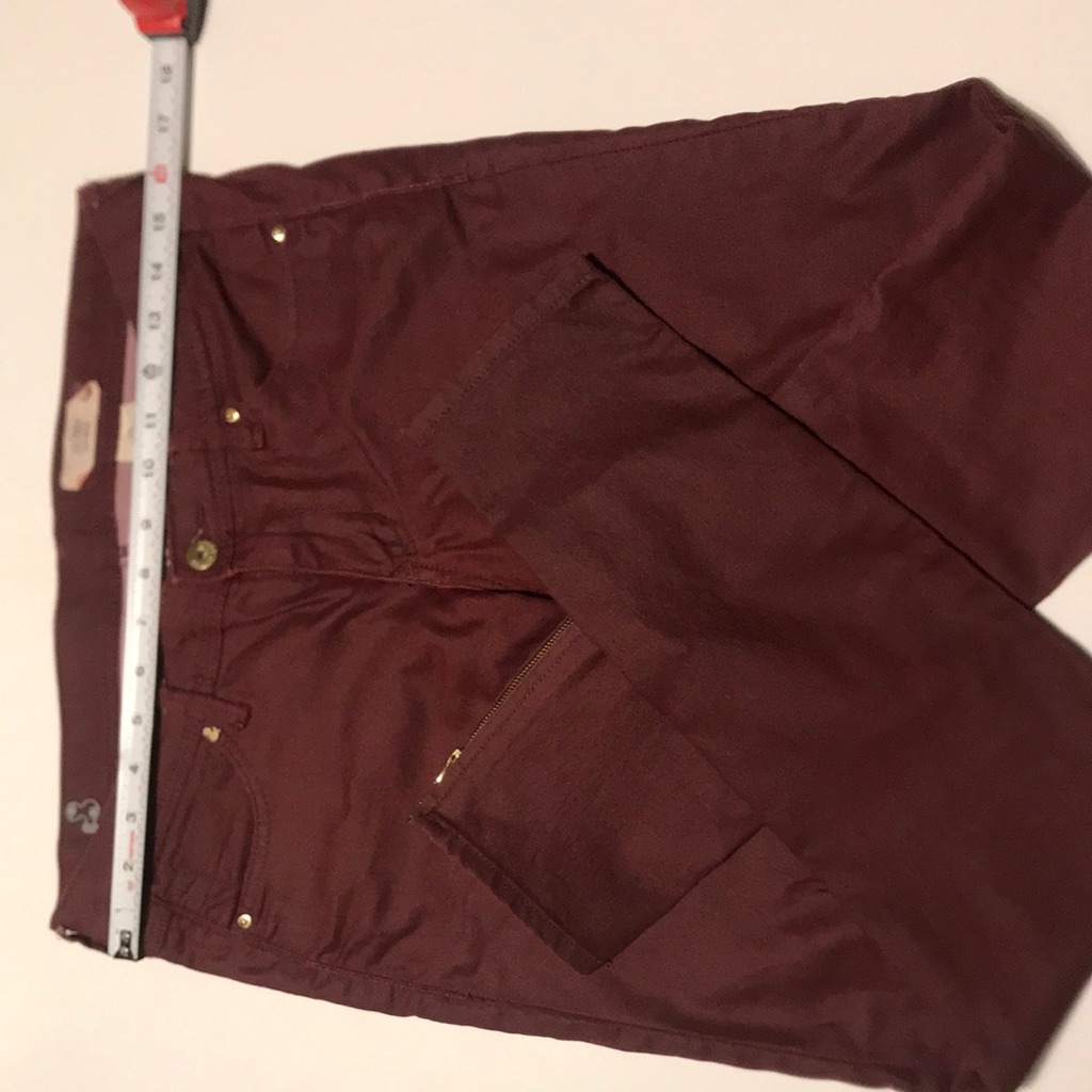 Maroon Skinny Jeans, New Condition. Low Waist 28
